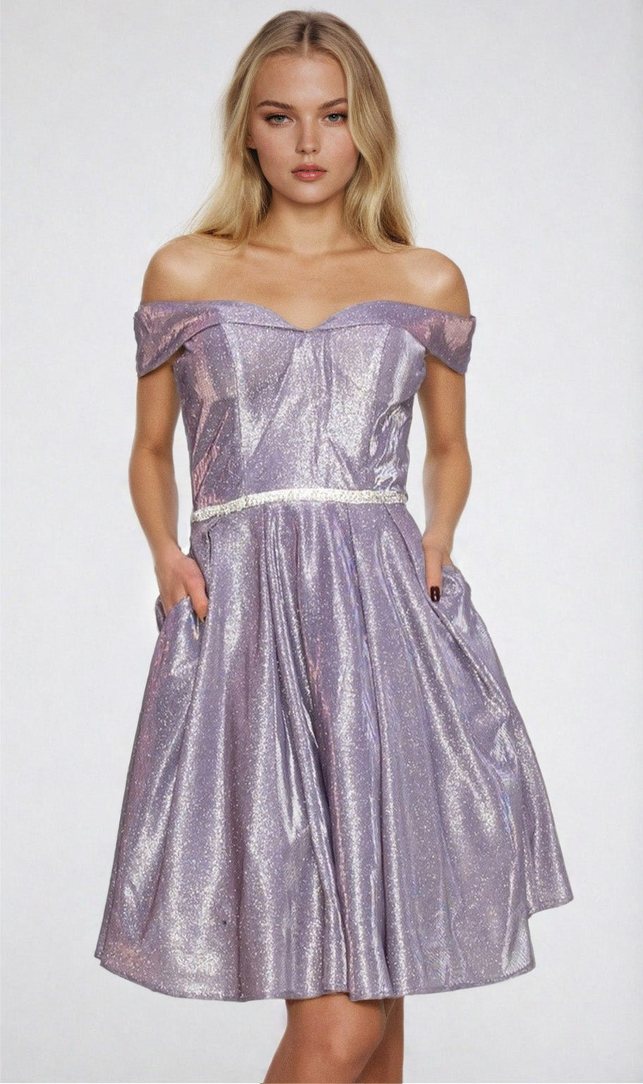 A woman models the Off-Shoulder Short Glitter Homecoming Dress 8012J, a knee-length, shimmery lavender gown with pockets, against a plain light background.